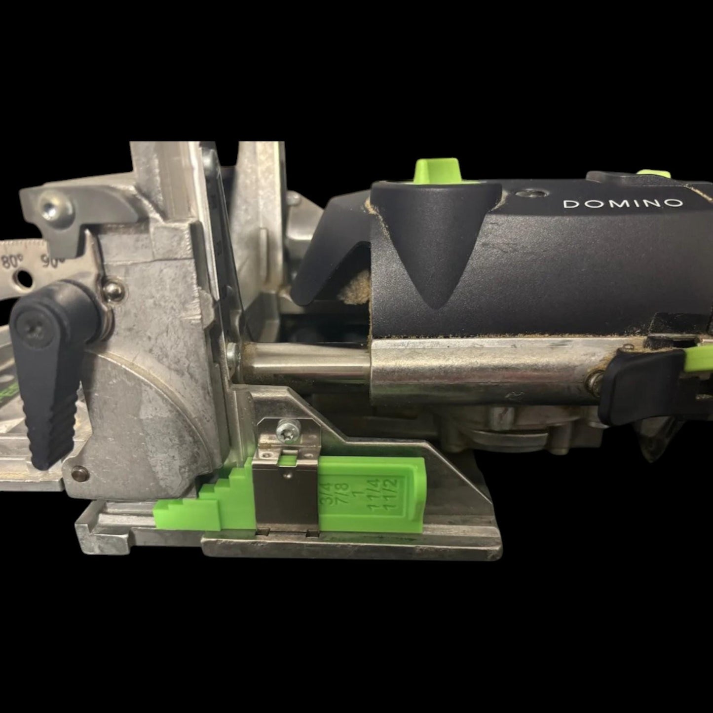Gauge block inserted into Festool Domino joiner tool for quick plunge depth setup using 3D-printed spacer