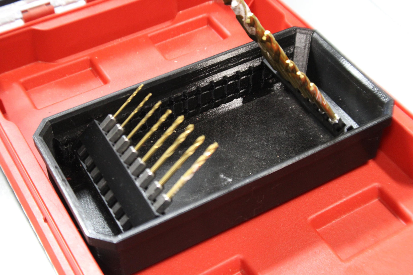 Bit Bins designed for use with the Milwaukee Low-Profile Compact Small Parts Organizer. Made from durable PETG, this set includes all holders shown in the images: four small square bins and one long rectangular bin.