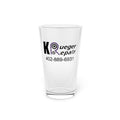A clear pint glass with a printed logo for 'Kueger Repair' and the phone number '402-889-6931' on the front, shown against a plain white background.