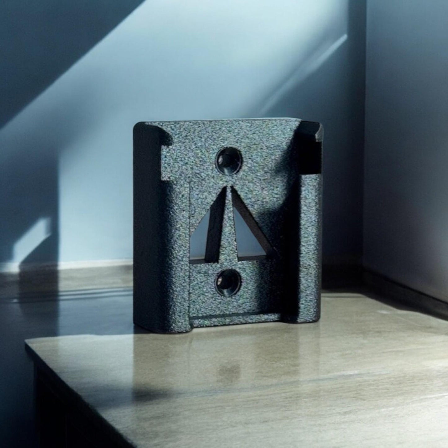 Close-up of a single Milwaukee M18 battery holder standing upright