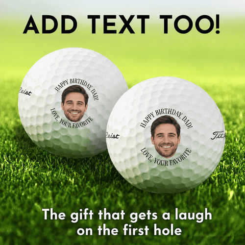 Two white golf balls on a green grass background with customizable printed text and a circular photo insert. Large text at the top reads 'ADD TEXT TOO!' and text at the bottom reads 'The gift that gets a laugh on the first hole'.