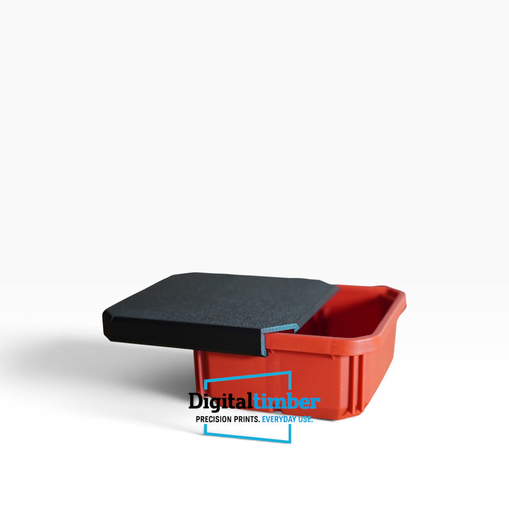A red plastic storage bin with a black textured lid or cover partially lifted off, shown on a clean white background. A 'DigitalTimber' brand logo watermark is visible at the bottom center.