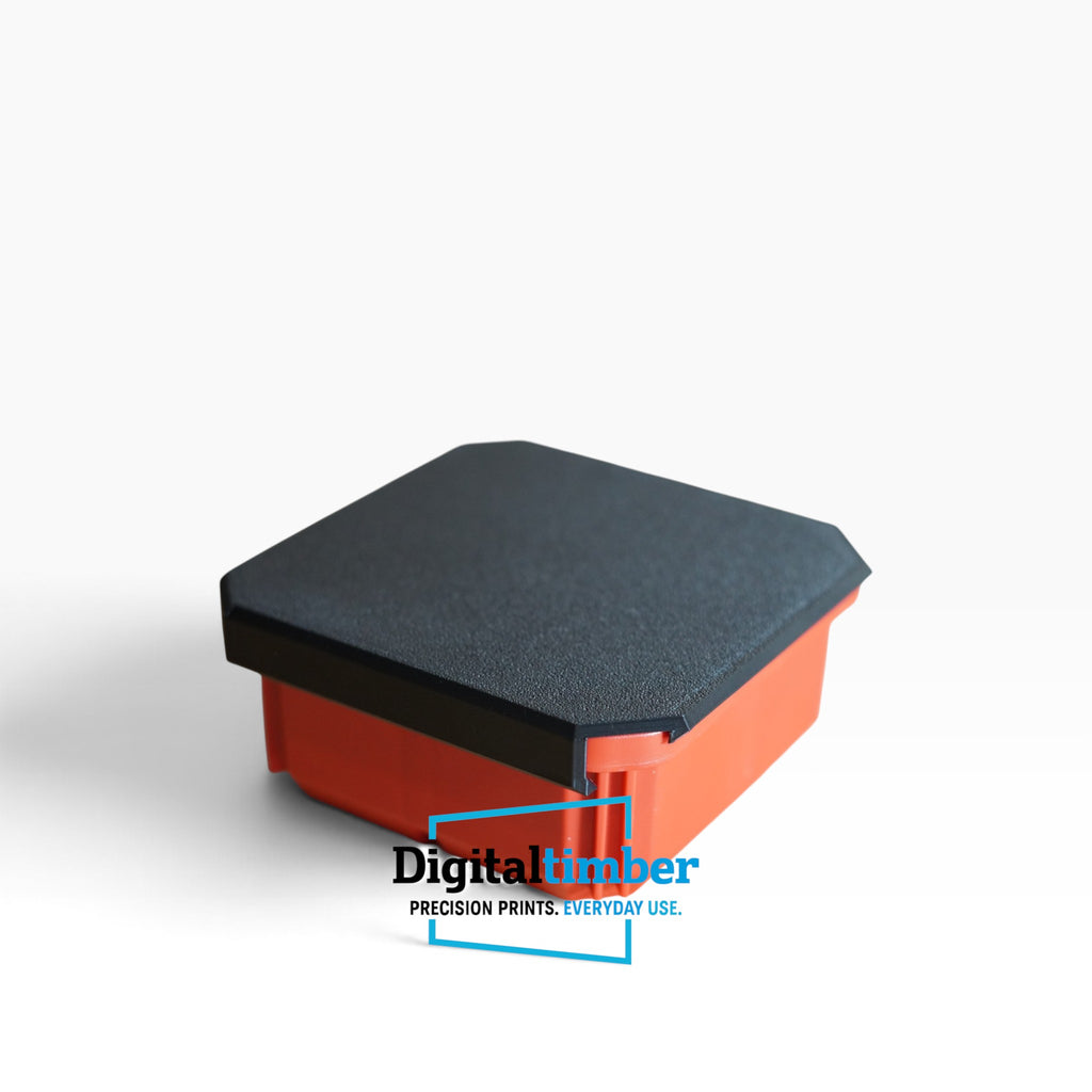 A square orange plastic container or box with a textured black lid, shown on a clean white background with a 'Digital Timber' watermark overlay.
