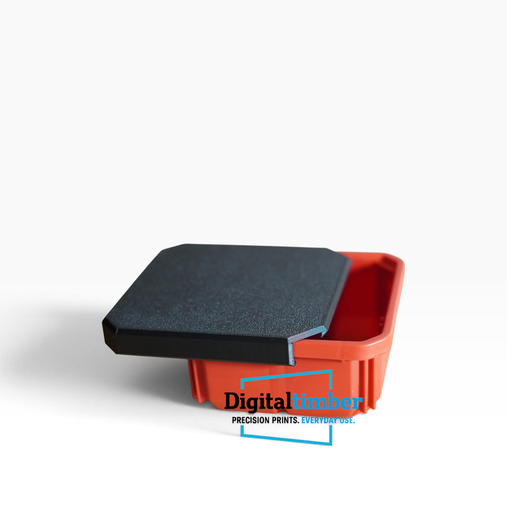 A digital caliper with a textured black metal measuring head resting on an orange plastic body, shown on a clean white background with a Digital Timber watermark.