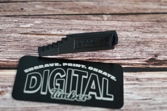 Black 3D-printed Domino depth gauge block with Digital Timber branding, displayed on wood background