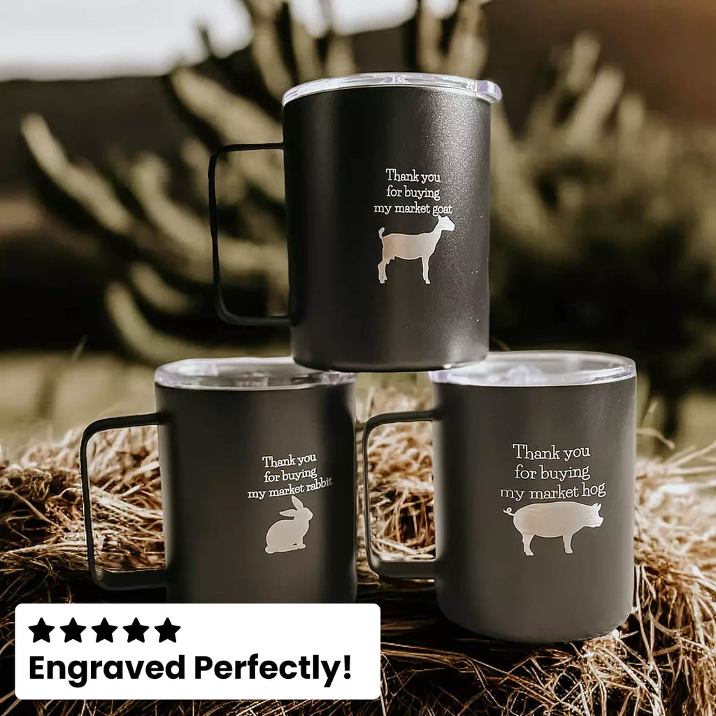 Three black mugs with animal illustrations and text on a hay background, with 'Engraved Perfectly!' label.