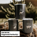 Three black mugs with animal illustrations and text on a hay background, with 'Engraved Perfectly!' label.