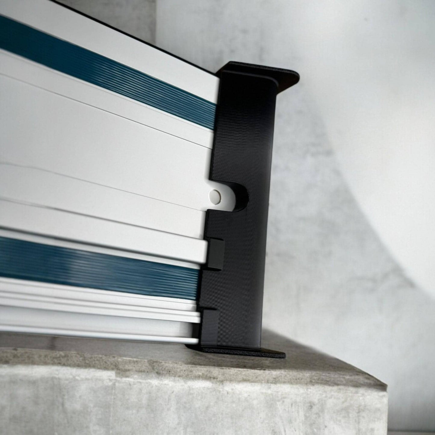 Cord deflector installed on Makita track rail for smoother cuts (etsy image id: 6580547584)