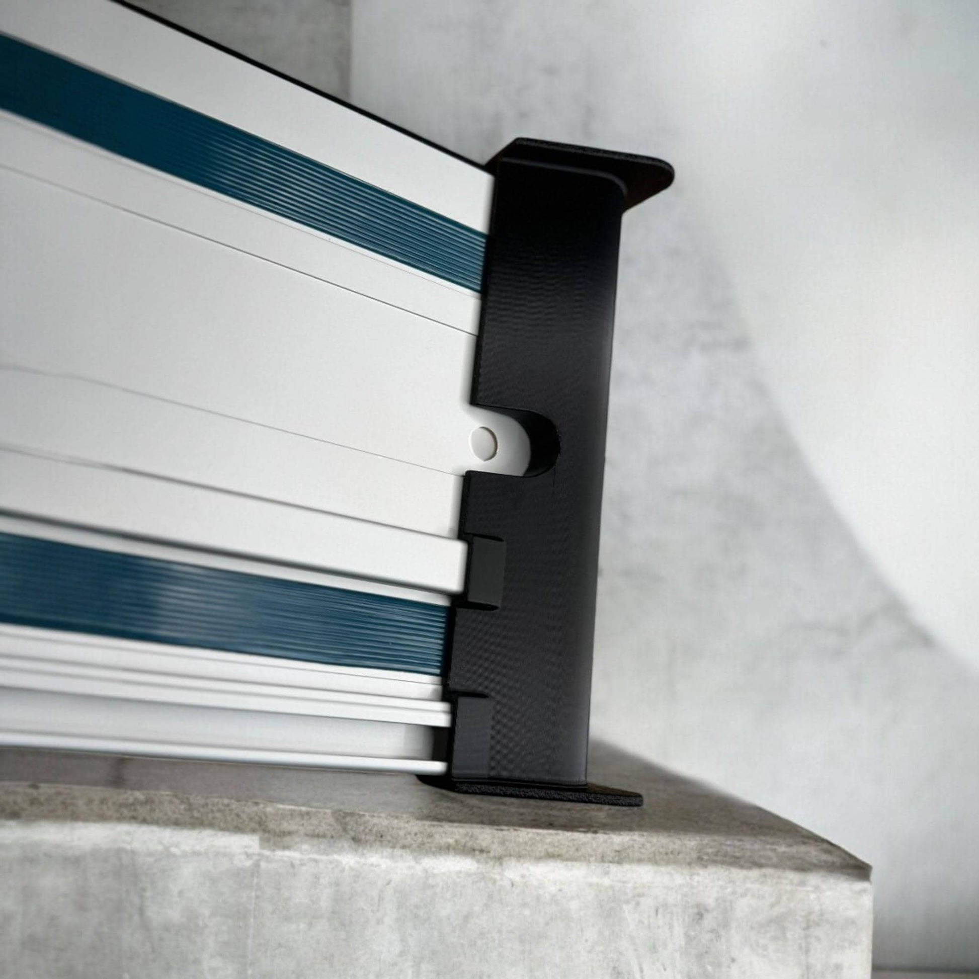 Cord deflector installed on Makita track rail for smoother cuts (etsy image id: 6580547584)