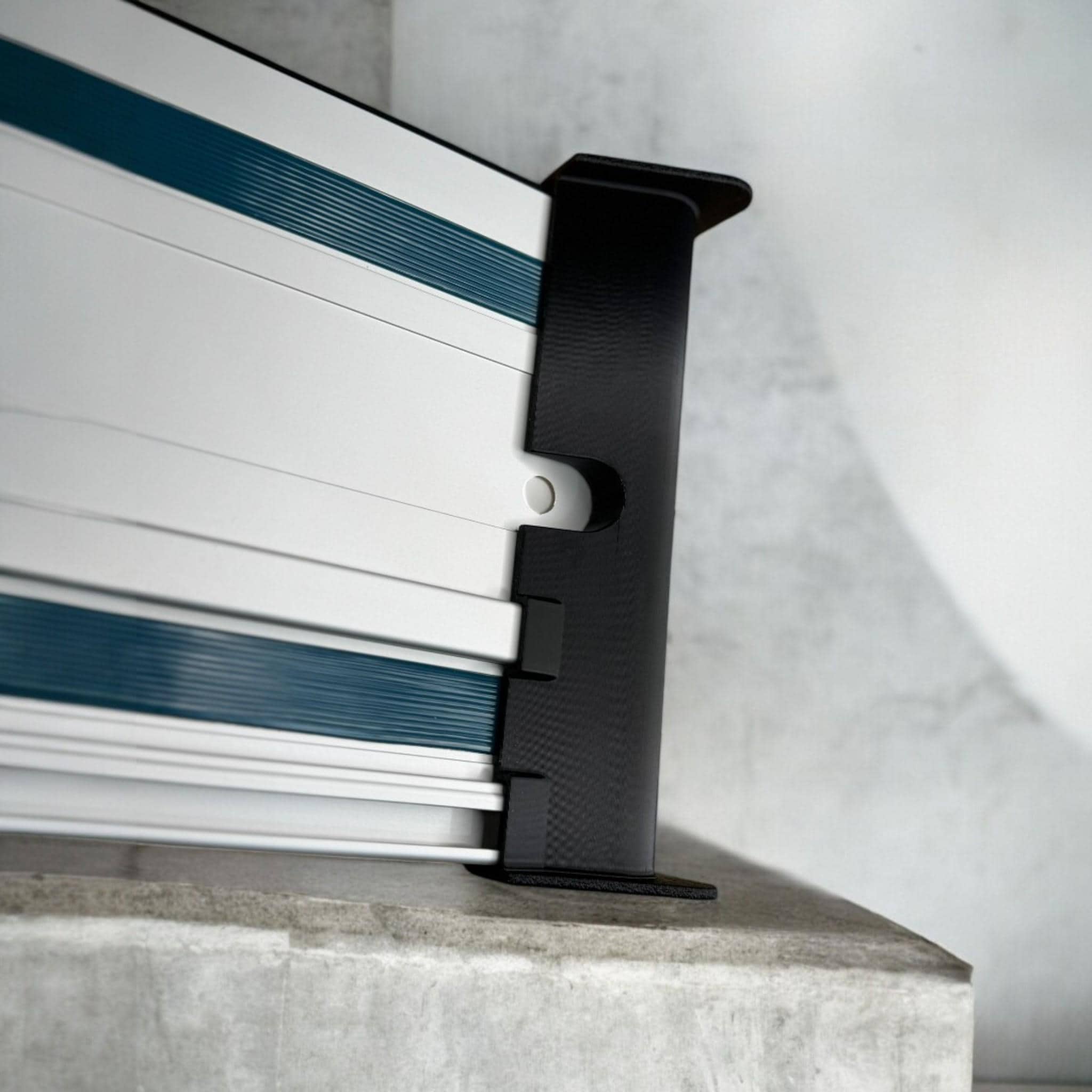 Cord deflector installed on Makita track rail for smoother cuts (etsy image id: 6580547584)
