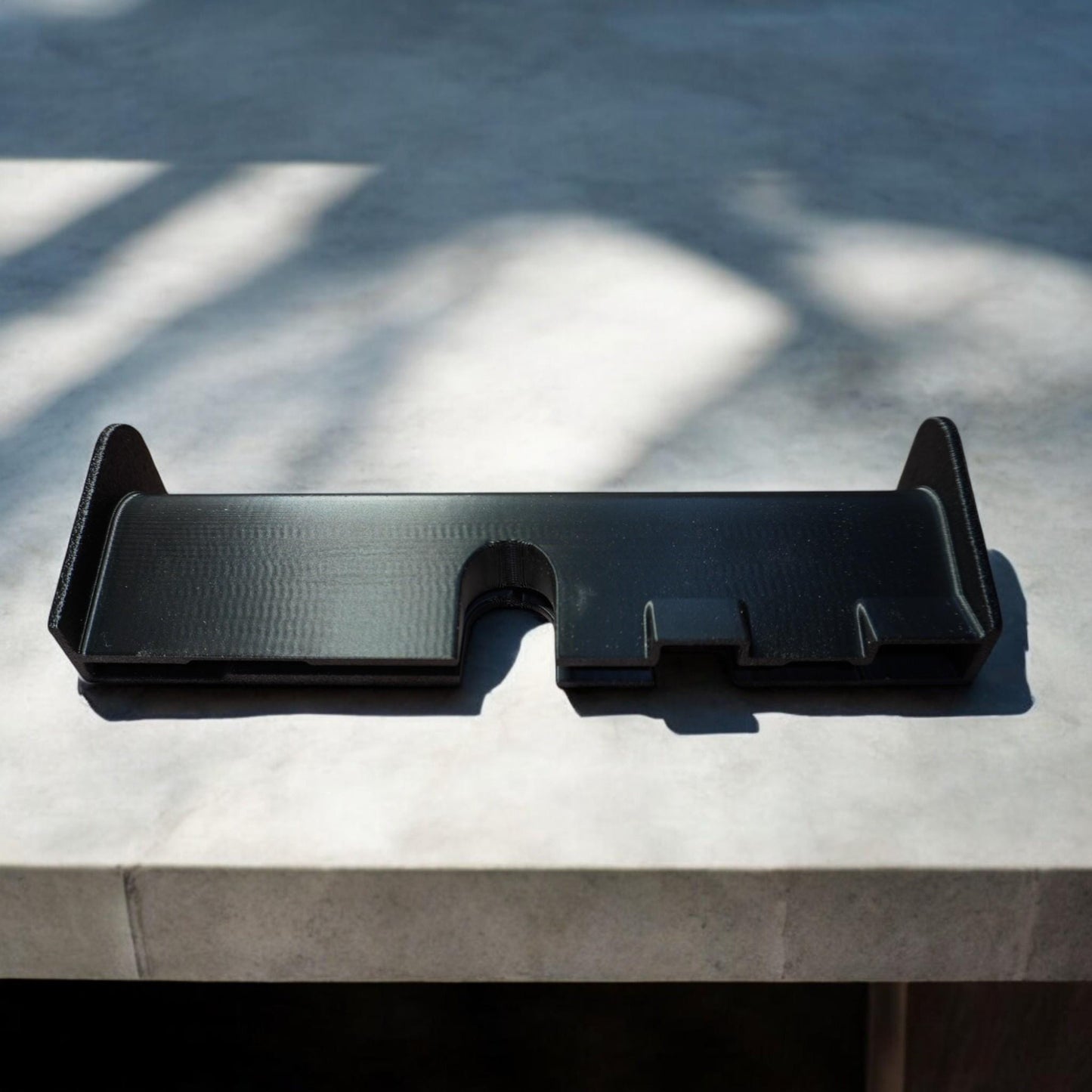 A hose and cord deflector that slides onto the starting end of a track saw guide rail, preventing cords and vacuum hoses from catching and ensuring smooth saw operation. Compatible with Festool and Makita tracks. (etsy image id: 6628667335)