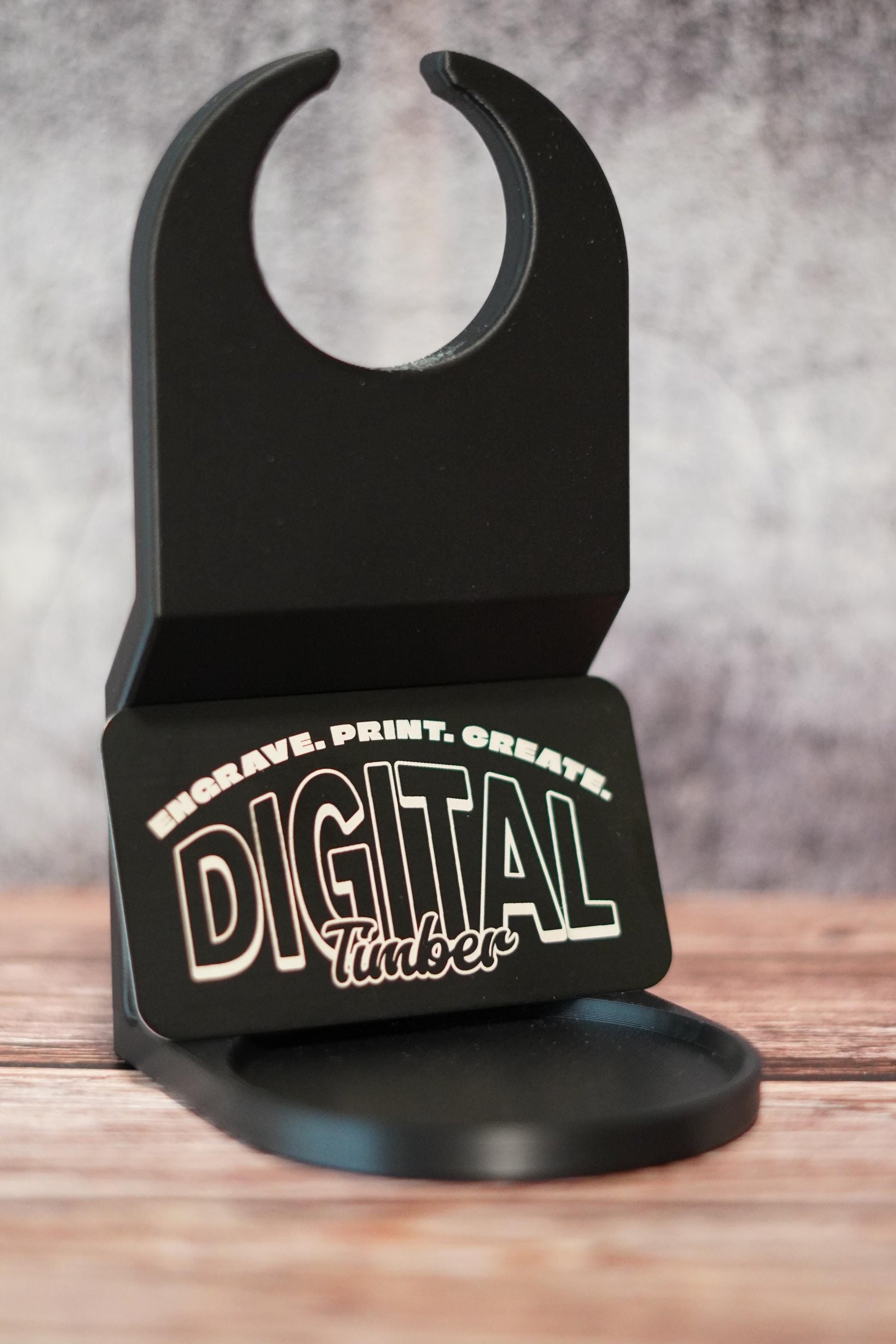 3D-printed laundry detergent cup holder with DigitalTimber logo, shown upright on a rustic wood surface. (etsy image id: 6736349818)