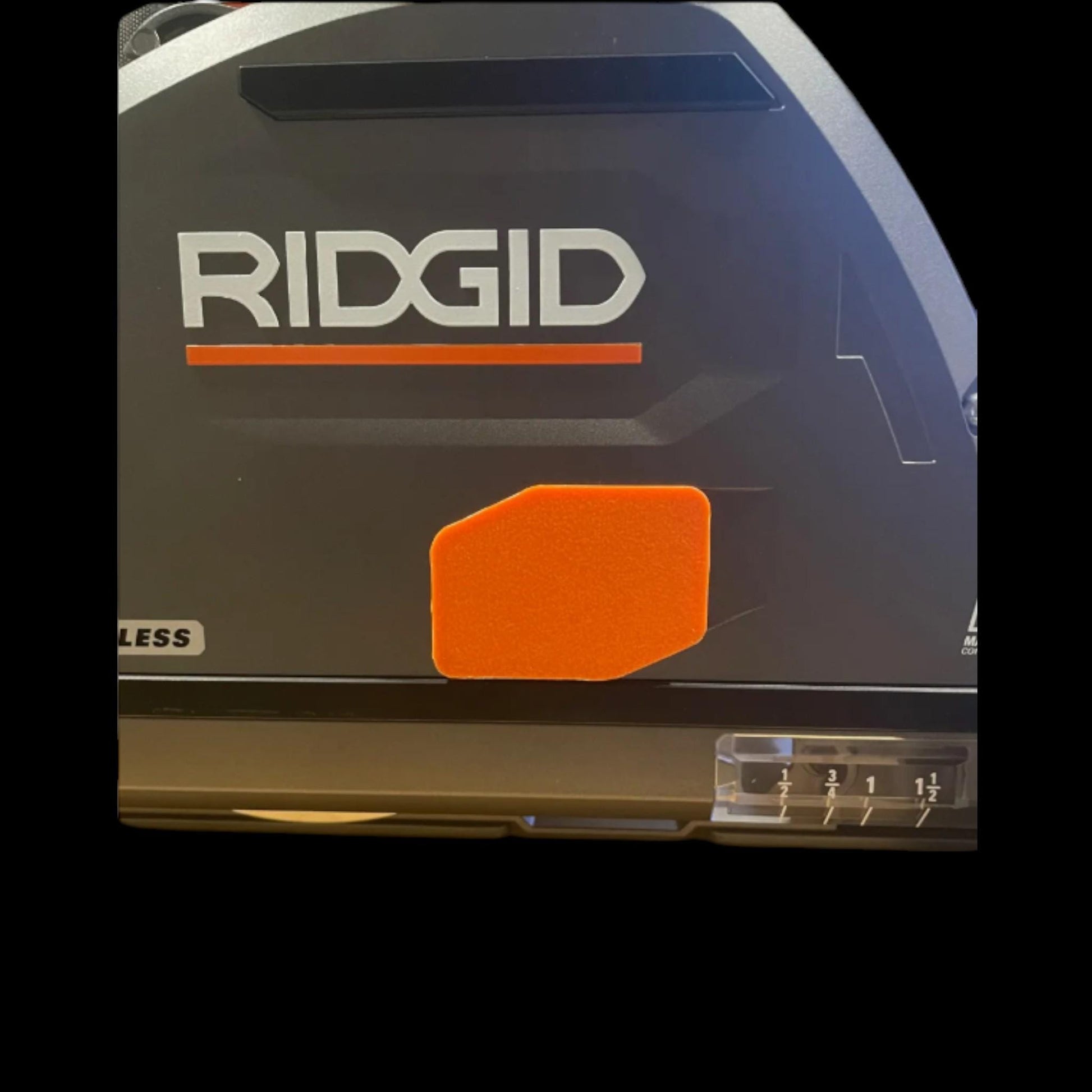 Orange 3D-printed arbor hole cover installed on Ridgid track saw housing (etsy image id: 6749315402)