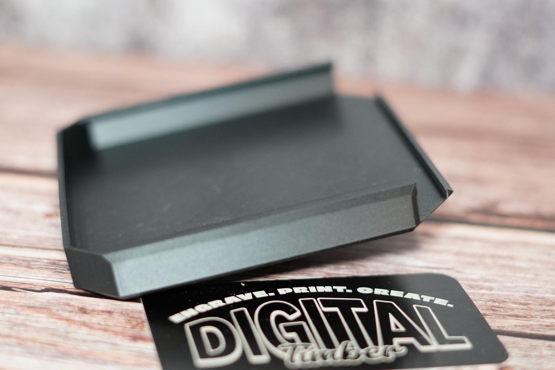 Close-up of a single black slide-on cover for small bins (etsy image id: 6791894016)