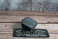 Side view of 3D-printed arbor dust plug for Ridgid track saw standing upright (etsy image id: 6797338005)