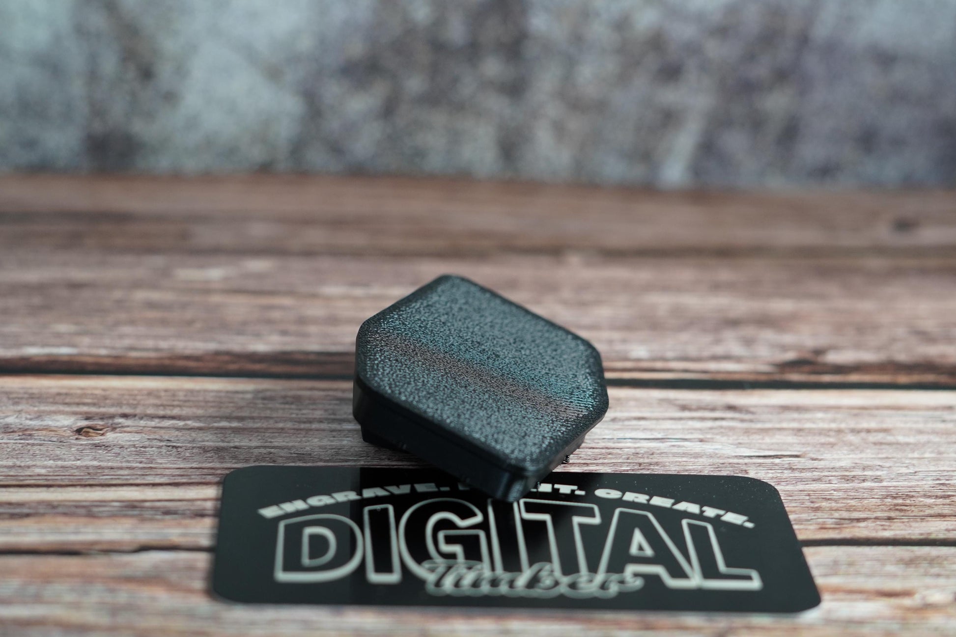 Side view of 3D-printed arbor dust plug for Ridgid track saw standing upright (etsy image id: 6797338005)