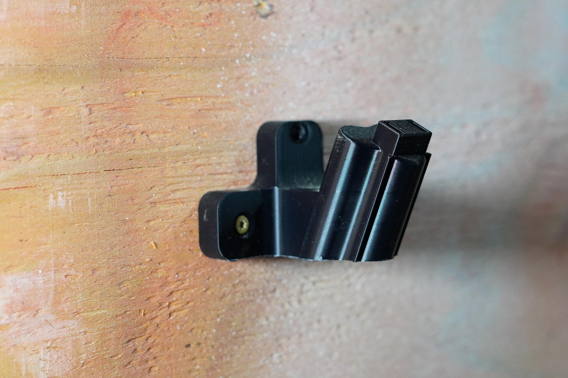 Close-up of 3D-printed M12 tool mount on wood panel (etsy image id: 6835668883)