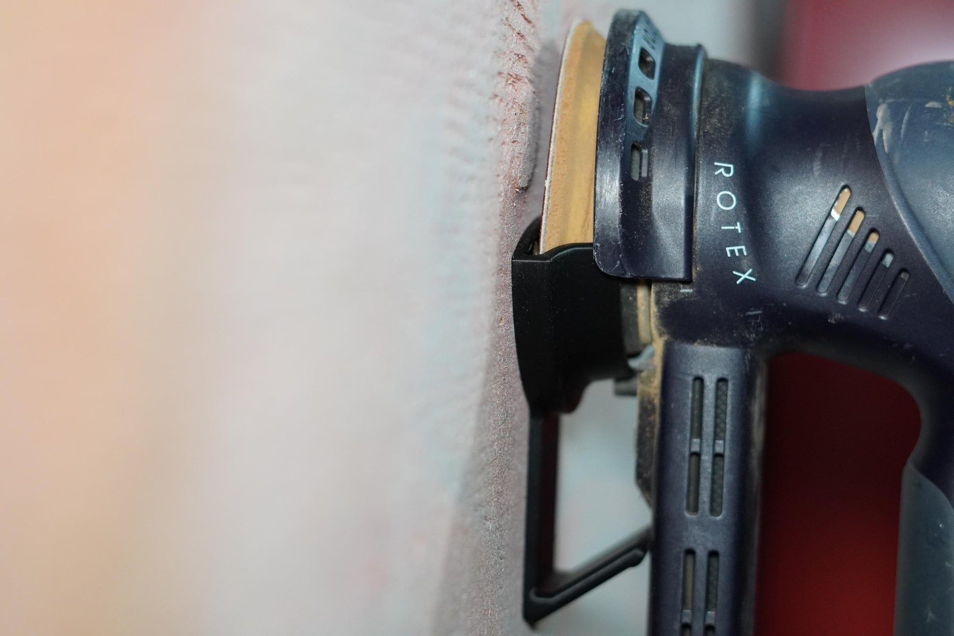 Angled view of Festool R90 mount holding sander with pad attached (etsy image id: 6840033909)
