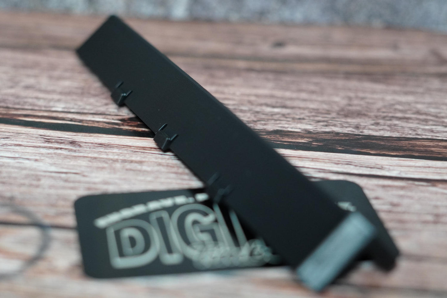 Angled view of 3D-printed label insert on wood background (etsy image id: 6891154324)