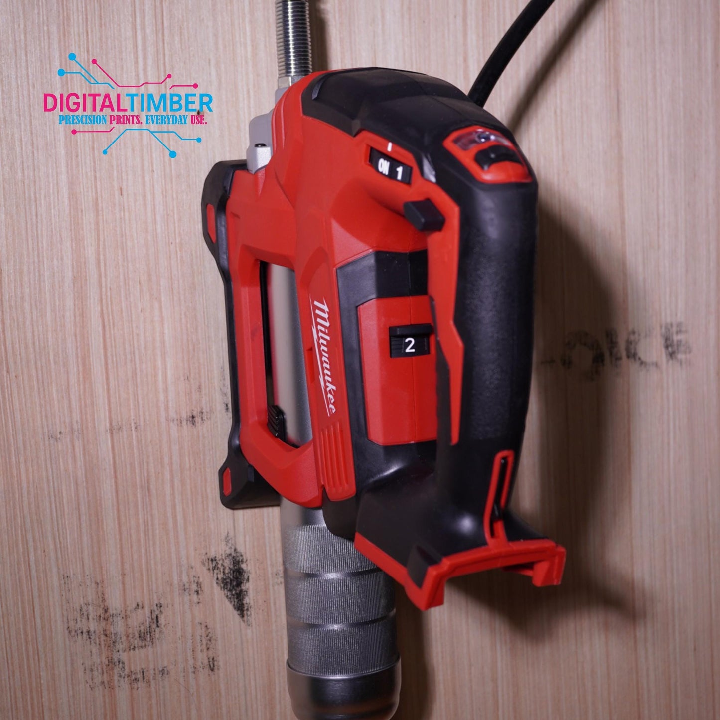 Grease gun mounted to wood wall for display purposes (etsy image id: 7249905427)