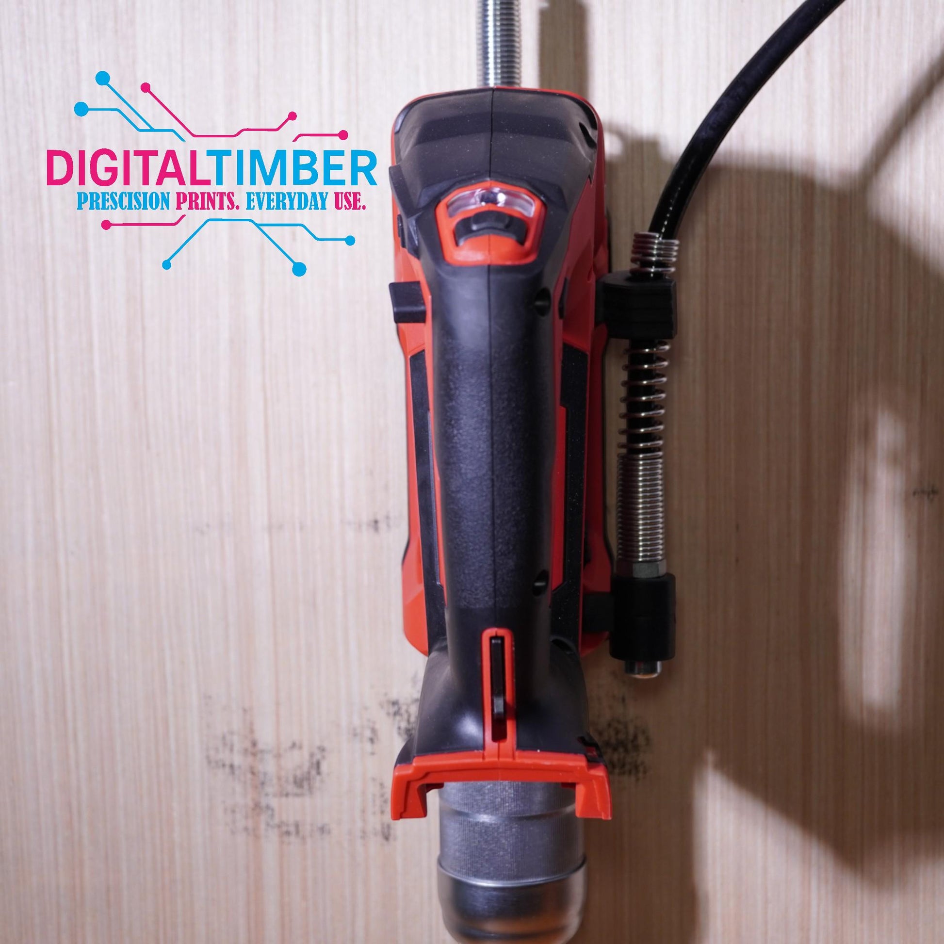 Grease gun mounted to wood wall for display purposes (etsy image id: 7249905429)