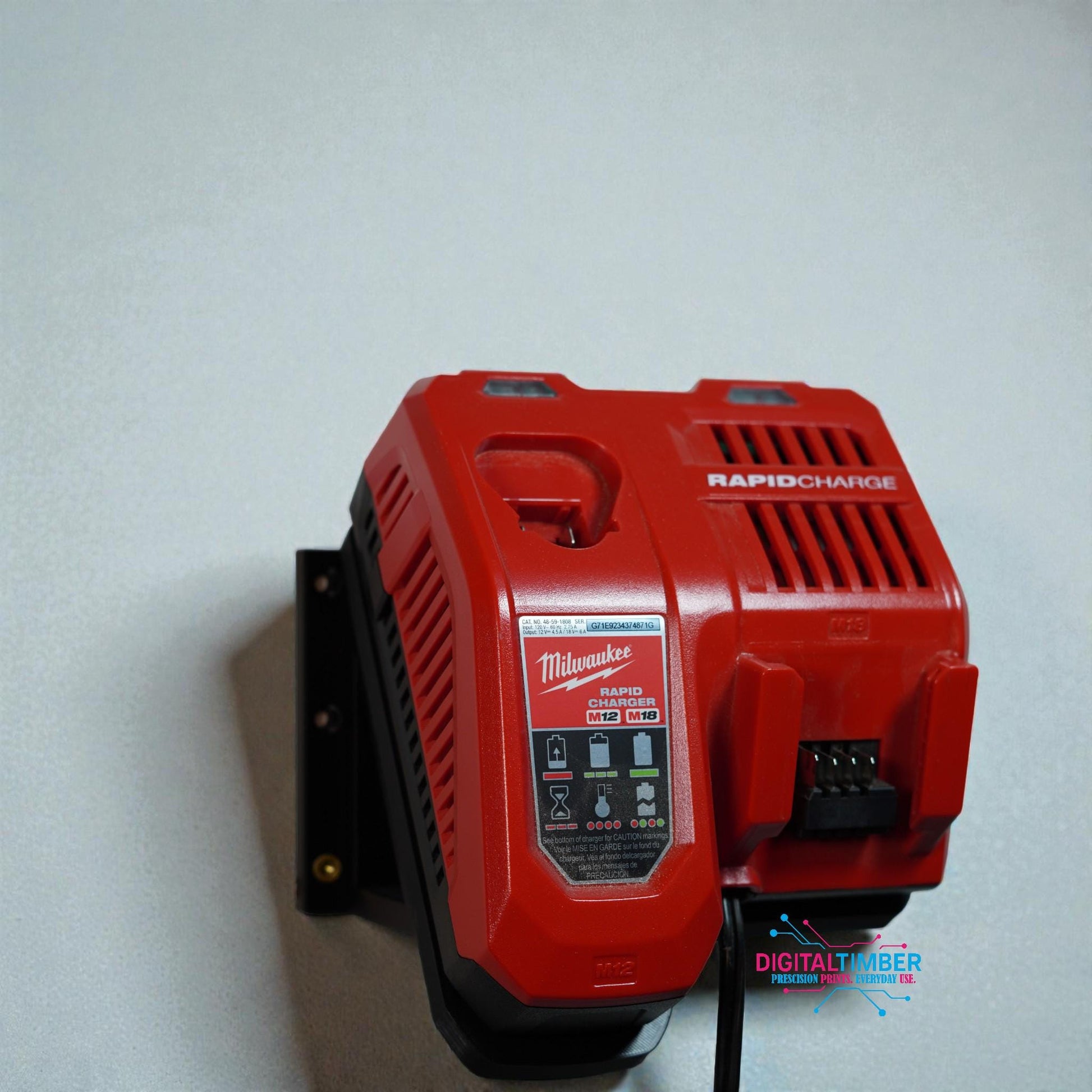 Milwaukee M12 M18 Rapid Charger mounted securely on 3D printed wall bracket with power cord attached (etsy image id: 7490909935)