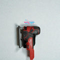 Milwaukee M18 Fuel jigsaw placed vertically on 3D printed wall mount