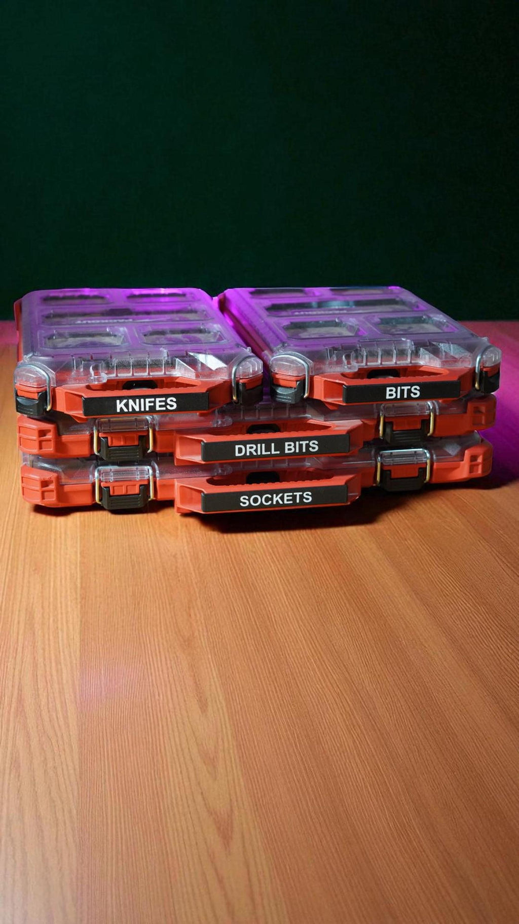 Two stacks of three orange and clear storage bins with black labels that read "KNIVES," "DRILL BITS," and "SOCKETS" on the left stack, and "BITS" on the top right bin. __etsy:8313066750
