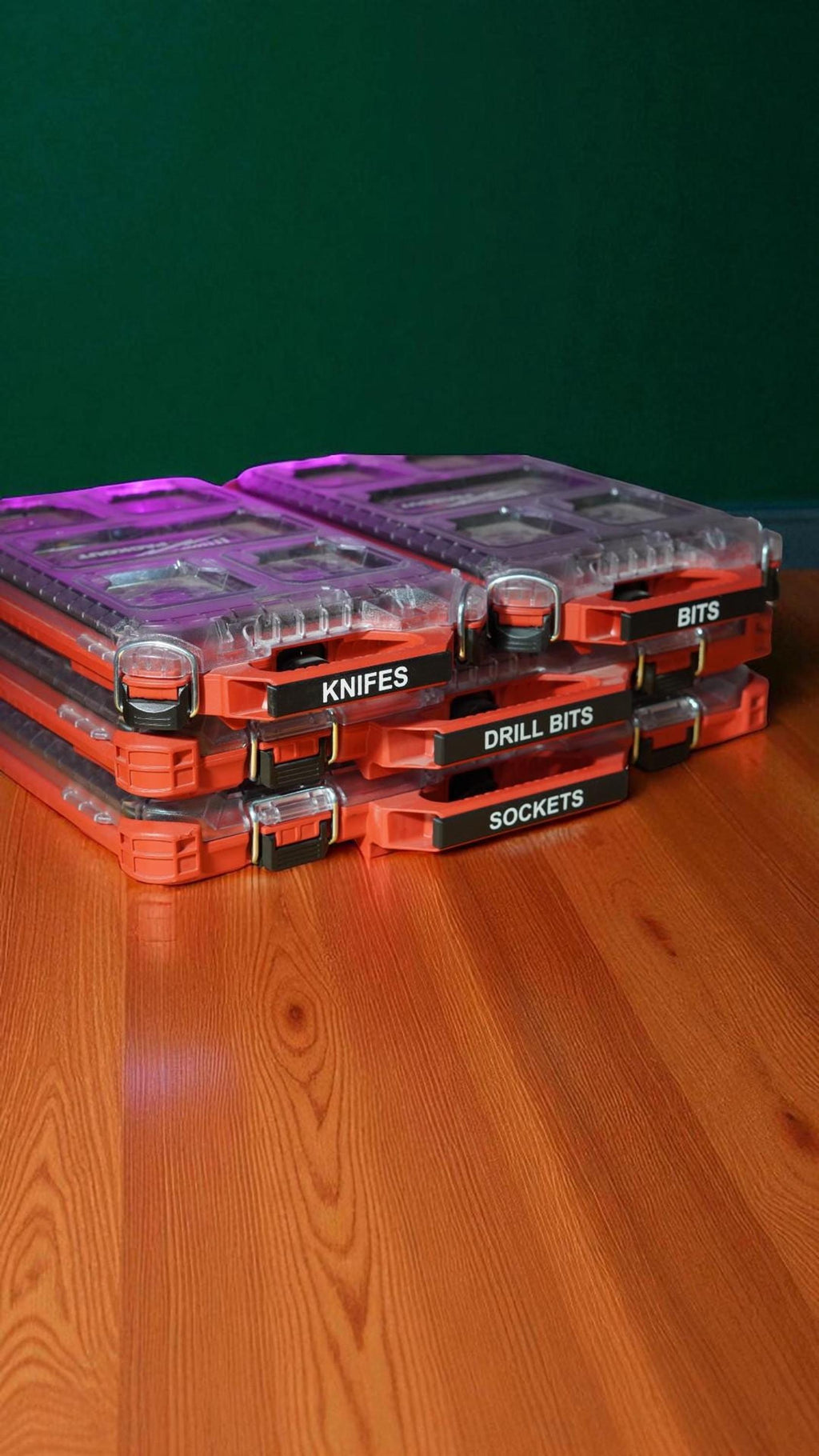 Two stacks of three orange and clear storage bins with black labels that read "KNIVES," "DRILL BITS," and "BITS" on the left stack, and "SOCKETS" on the bottom right bin. __etsy:8360952387