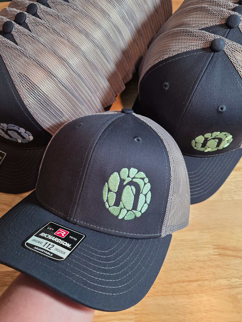 Custom Richardson 112 hats featuring unique embroidery design, perfect for branding and team gear.