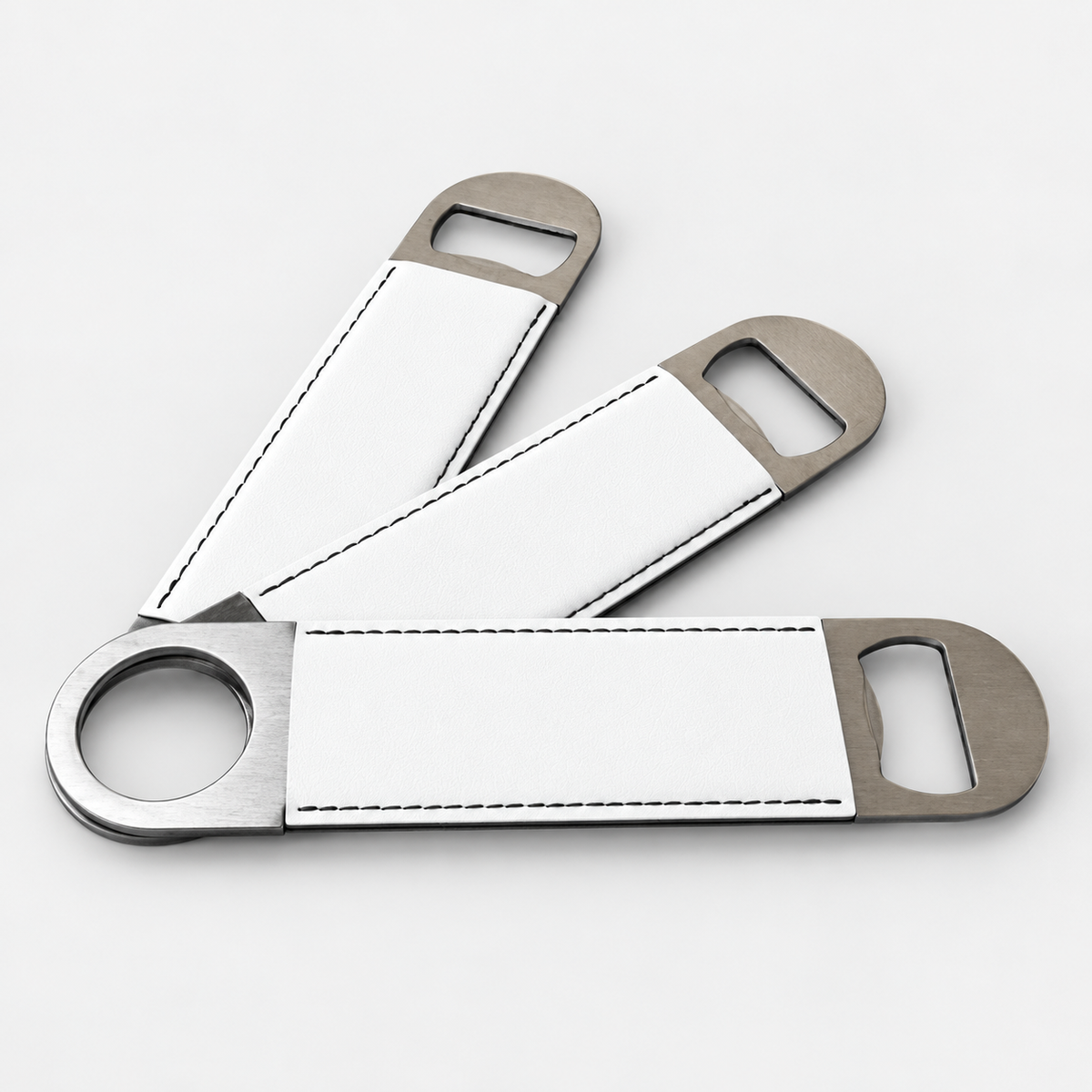 Bright White leatherette bottle openers before custom UV printing, light gray background