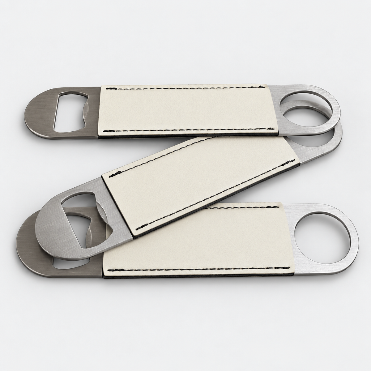 Eggshell leatherette bottle openers before custom UV printing, light gray background