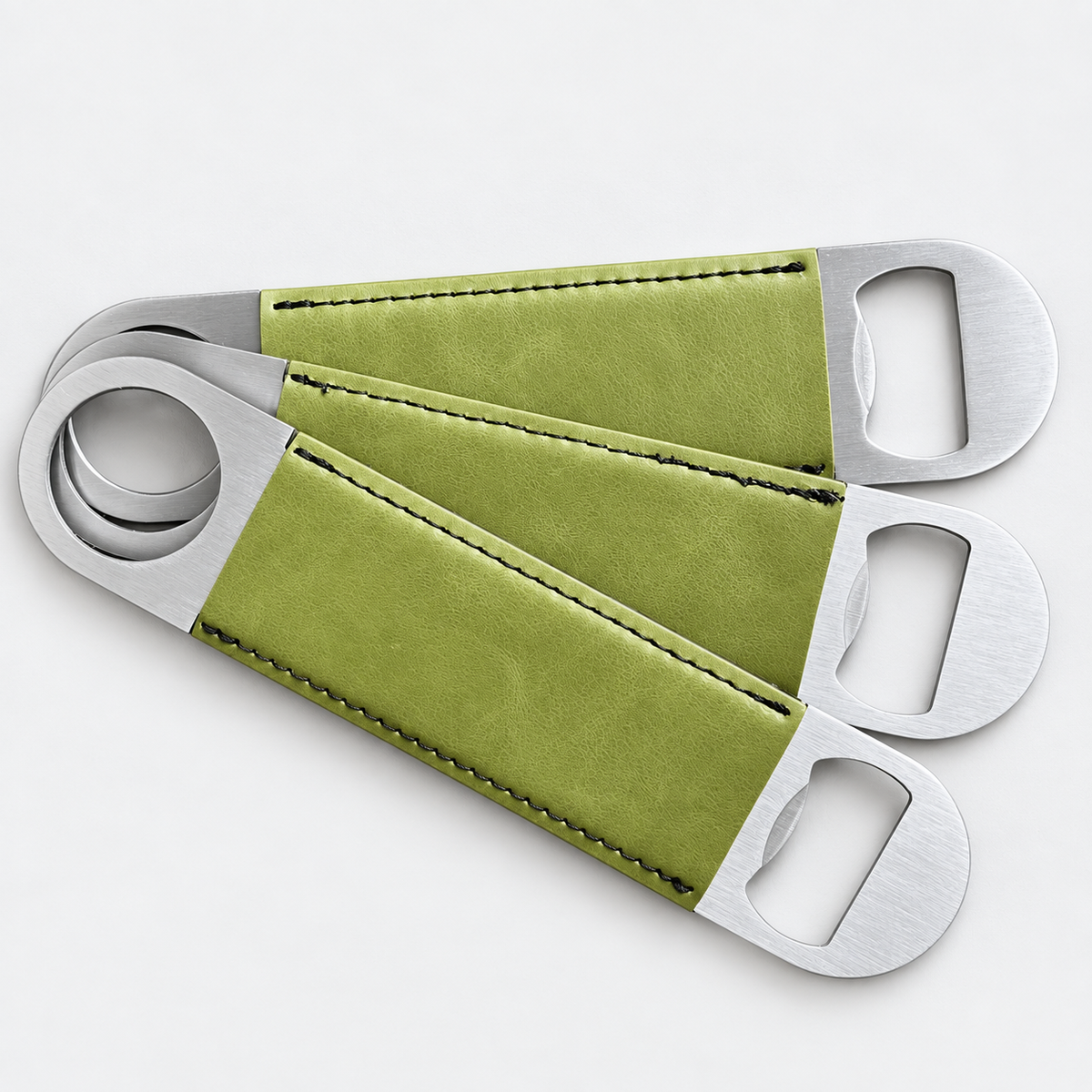 Olive leatherette bottle openers before custom UV printing, light gray background