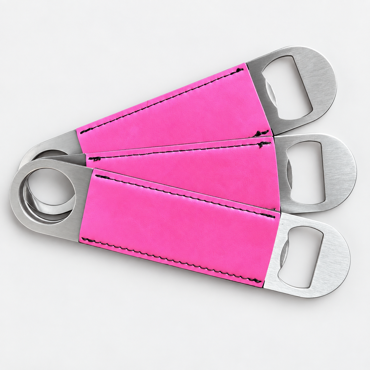 Primrose leatherette bottle openers before custom UV printing, light gray background