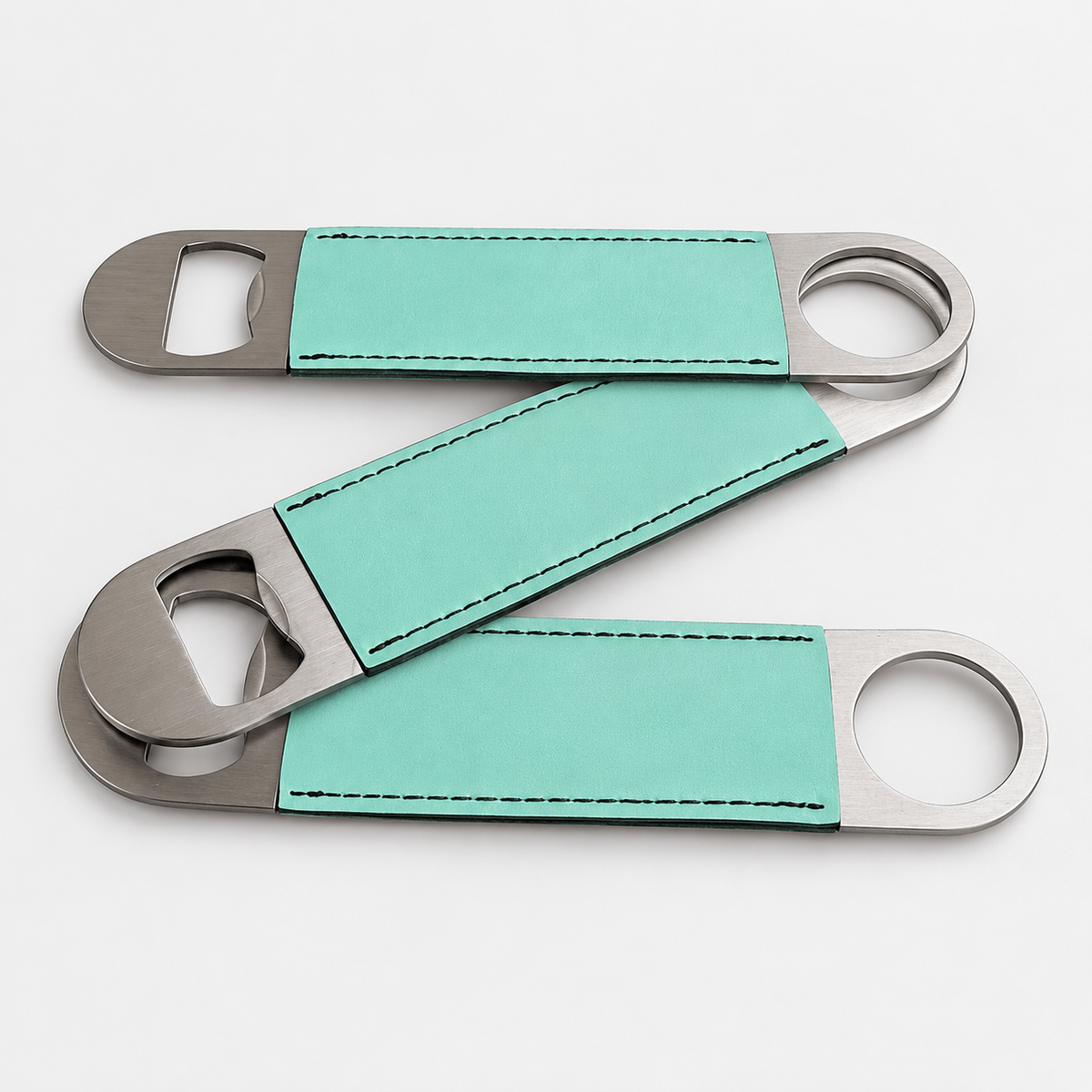 Seafoam Green leatherette bottle openers before custom UV printing, light gray background