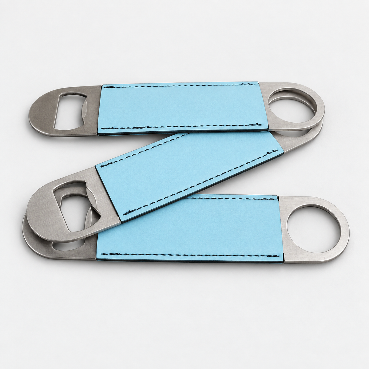 Sky Blue leatherette bottle openers before custom UV printing, light gray background